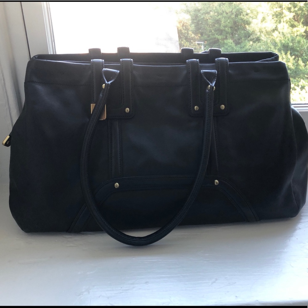 Tumi 100% Leather Handbag (Style Ebury Sac Voyage)